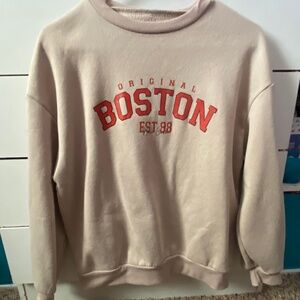 tan sweatshirt